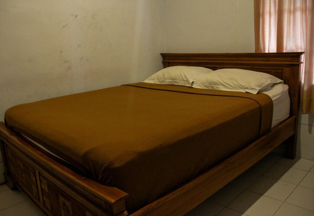 Nyoman Guesthouse Canggu Δωμάτιο φωτογραφία