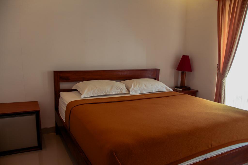 Nyoman Guesthouse Canggu Δωμάτιο φωτογραφία