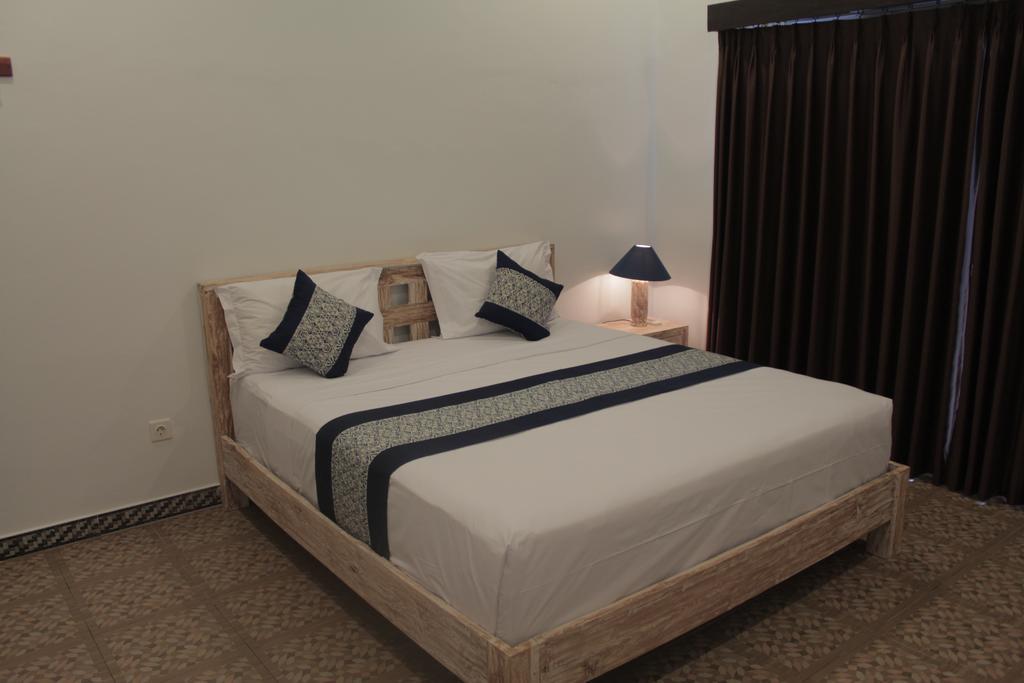 Nyoman Guesthouse Canggu Δωμάτιο φωτογραφία